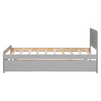 Cama individual de madera gris con cama nido