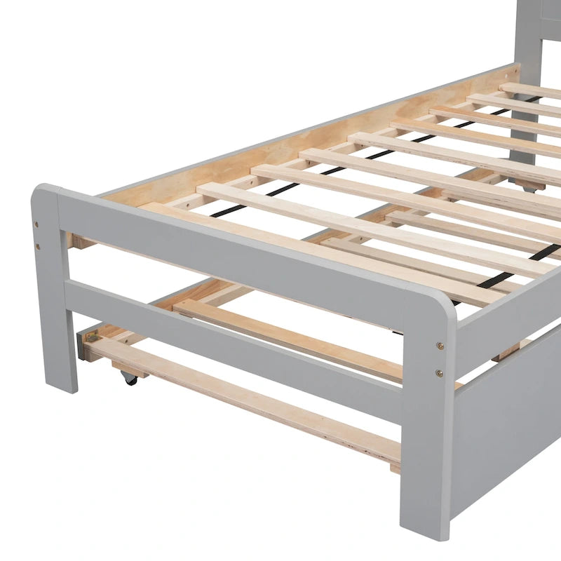 Cama individual de madera gris con cama nido